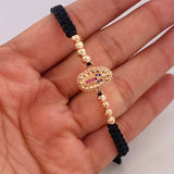 Pulsera Tejida Negra Virgen de Guadalupe Oro Rosa 18K