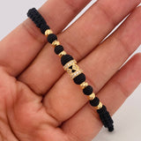 Pulsera Tejida Negra Rombos Oro Amarillo 18K