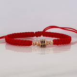 Pulsera Tejida Roja Cubo Oro Rosa 18K