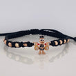 Pulsera Tejida Negra Pato Bolsa de Dinero Tres Oros 18K