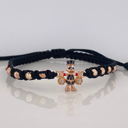 Pulsera Tejida Negra Pato Bolsa de Dinero Tres Oros 18K