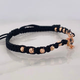 Pulsera Tejida Negra Pato Bolsa de Dinero Tres Oros 18K