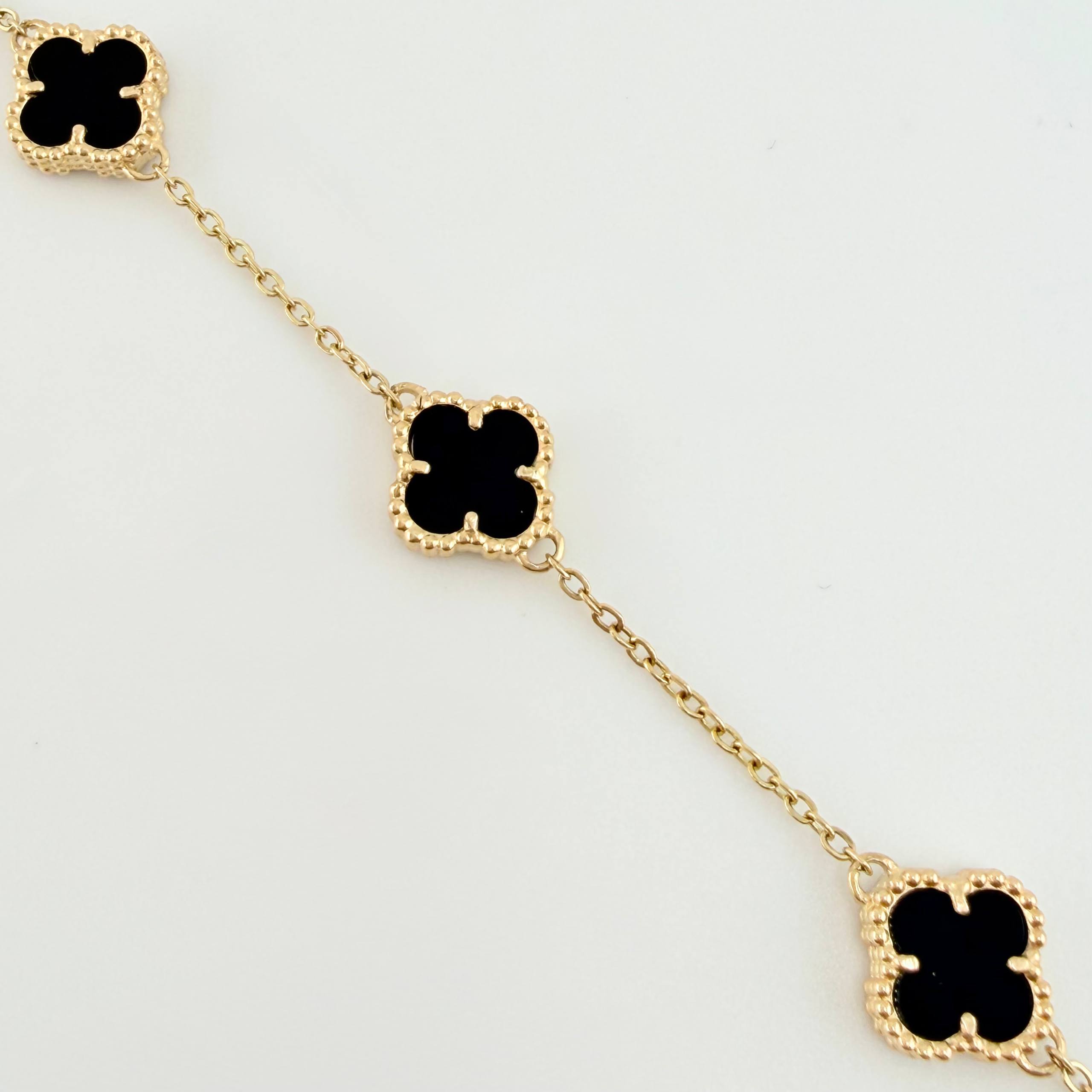 Pulso Aro seguido Trebol Onix Negro 5.45gr / 19.5cm-21cm / 10mm Oro Amarillo Nac.Esp. 18K