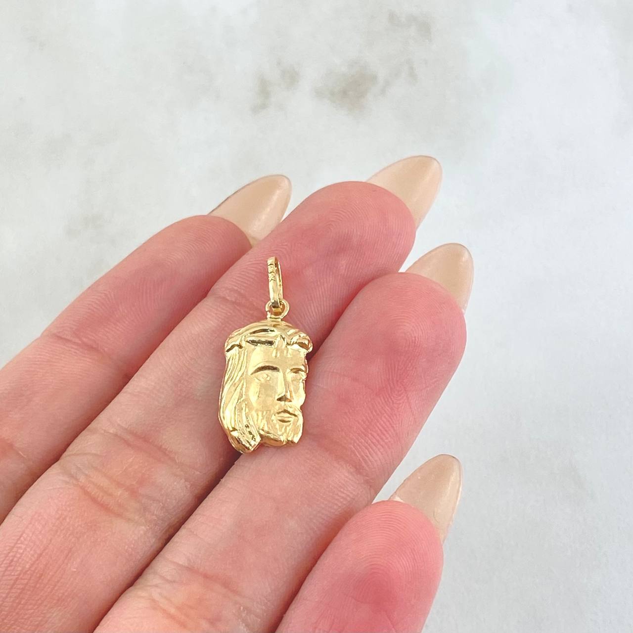Dije Rostro Jesús 0.85gr / 2.3cm / Oro Amarillo 18K ©