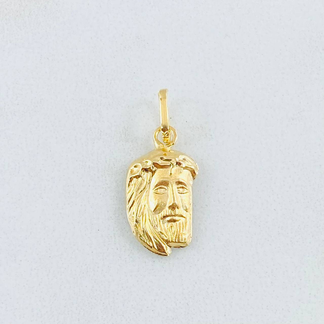 Dije Rostro Jesús 0.6gr / 1.9cm / Oro Amarillo 18K ©