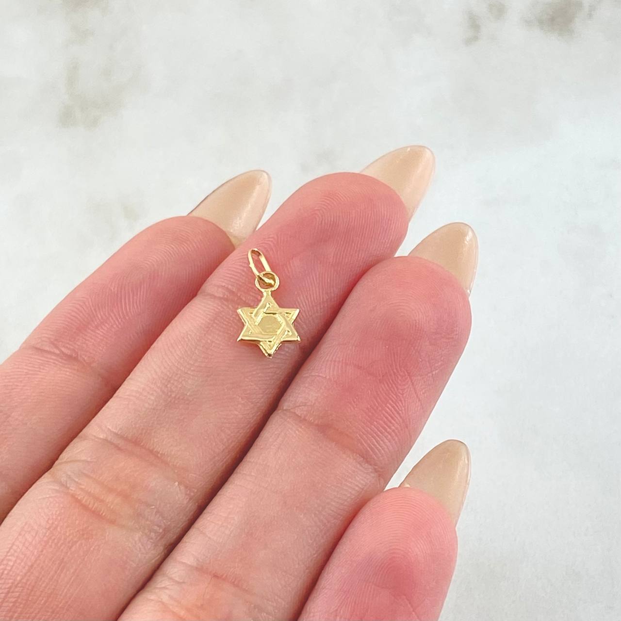 Dije Estrella de David 0.25gr / 1.3cm / Oro Amarillo 18K *
