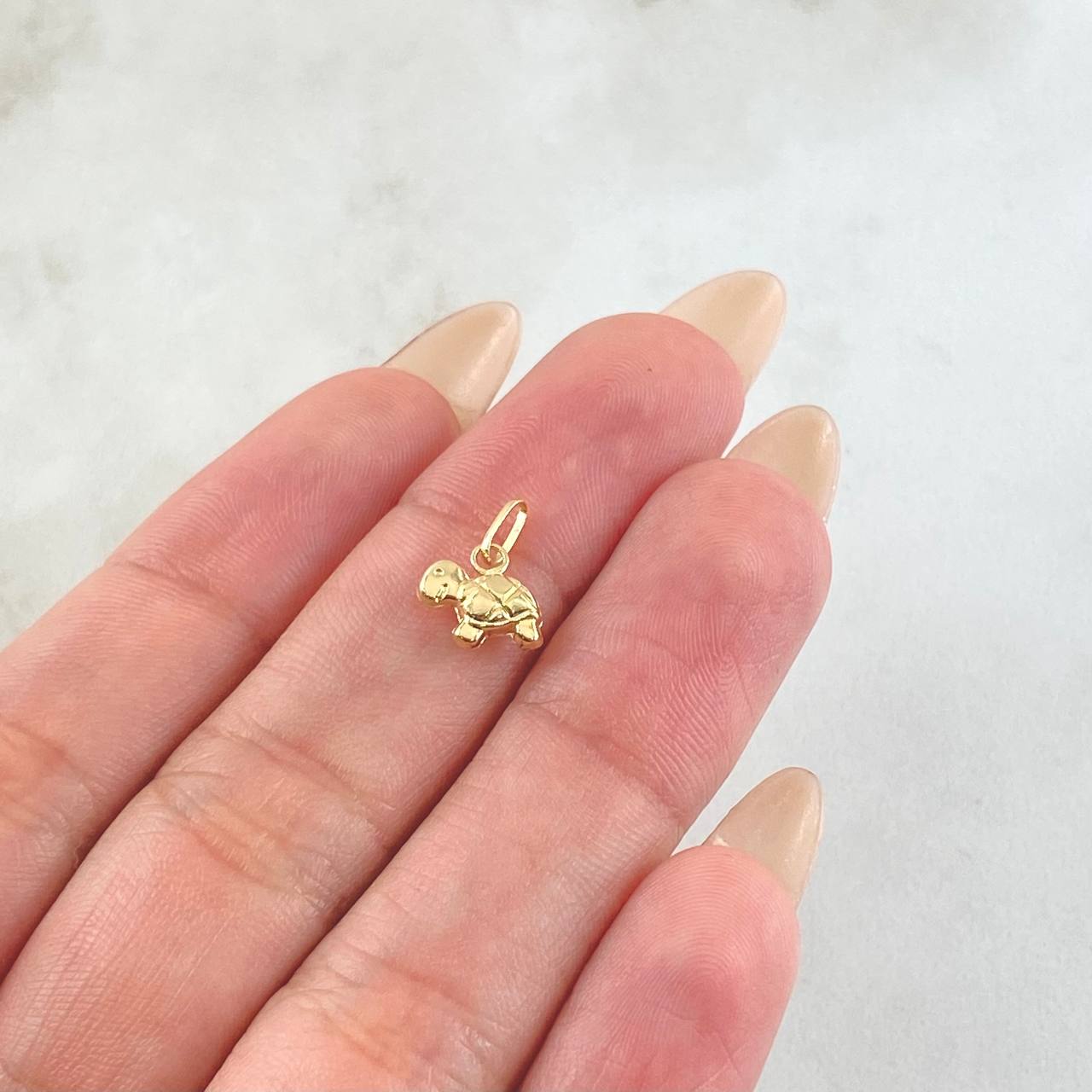 Dije Tortuga 0.25gr / 1cm / Oro Amarillo 18K *