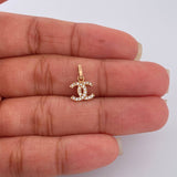 Dije Ola Cruzada 0.5gr / 1.3cm / Circones Blancos Oro Rosa &