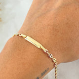Pulso Bebé GC Placa Rectangular Bordeada 1.8gr / 14cm / Oro 18K