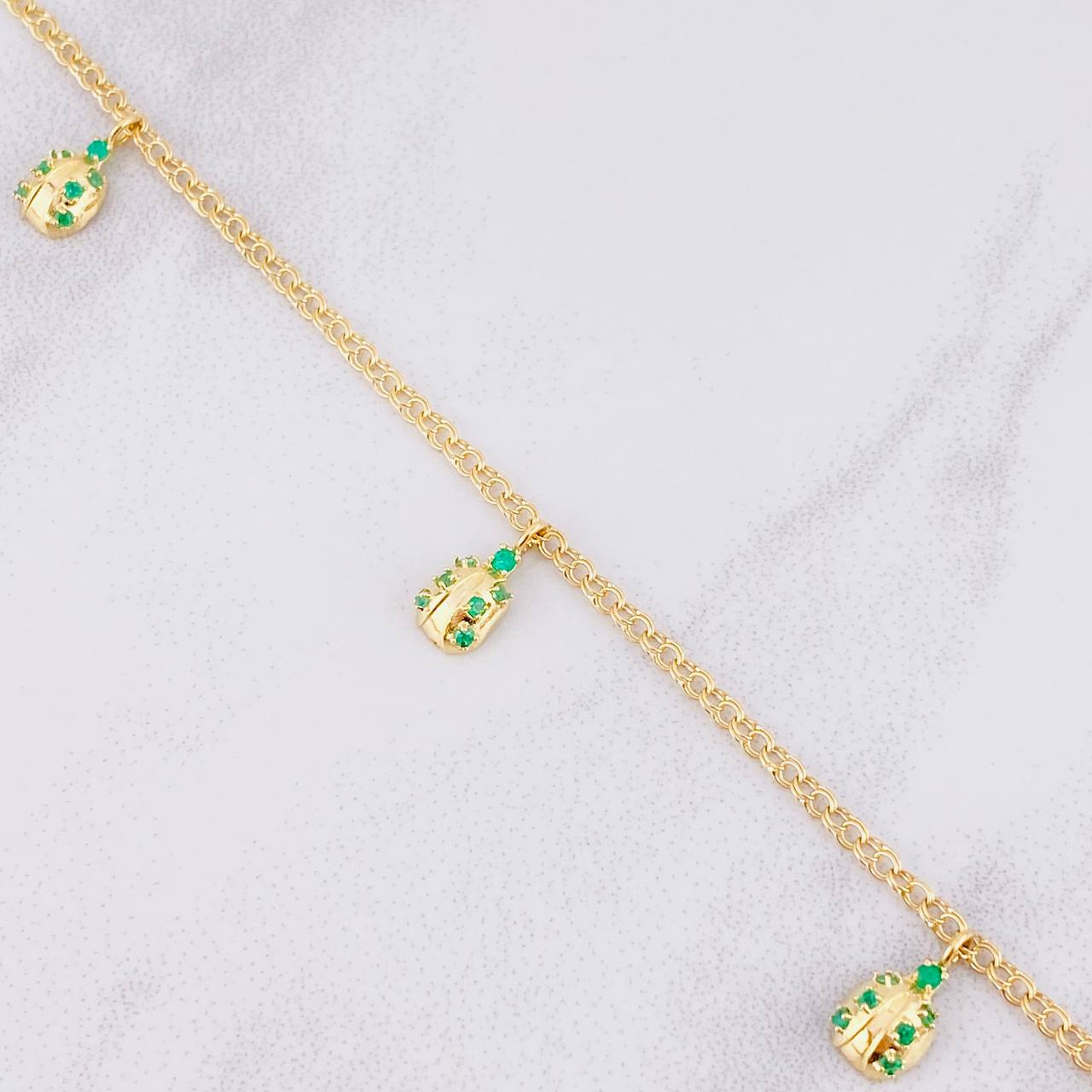 Tobillera Mariquitas Esmeraldas 67pts 5.55g / 27.9cm / 2.2mm Oro Amarillo 18K