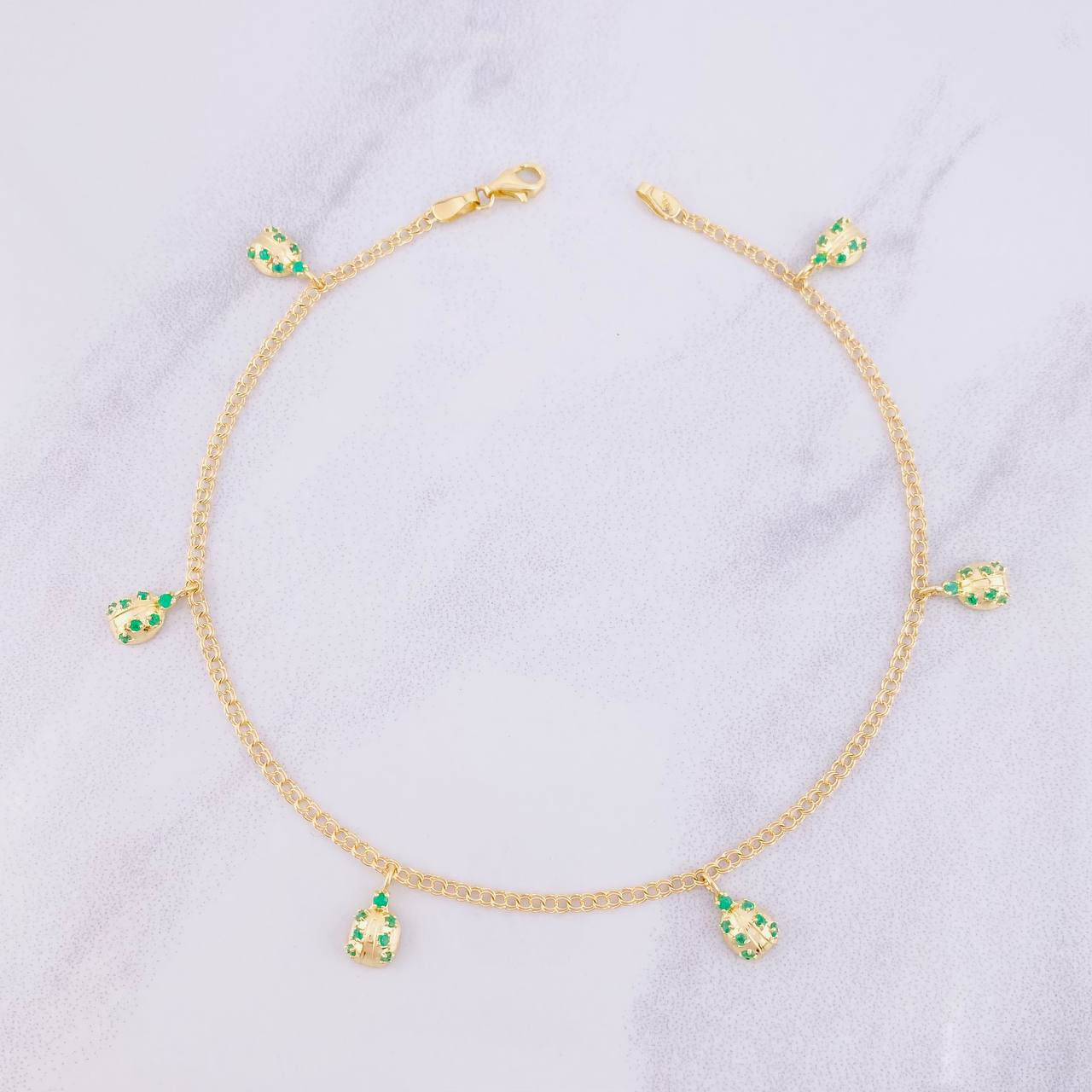 Tobillera Mariquitas Esmeraldas 67pts 5.55g / 27.9cm / 2.2mm Oro Amarillo 18K