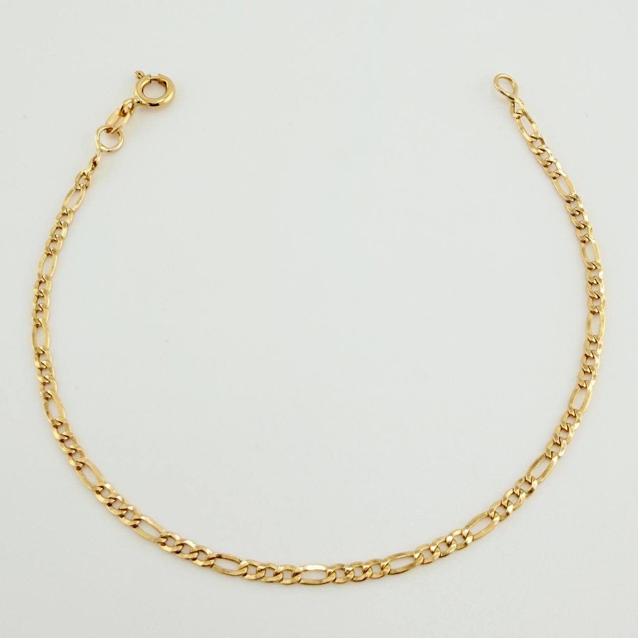 Pulso Figaro 1.4gr / 19cm / 2.2mm Oro Amarillo +1 18K $