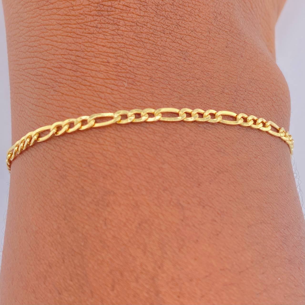 Pulso Figaro 1.4gr / 19cm / 2.2mm Oro Amarillo +1 18K $