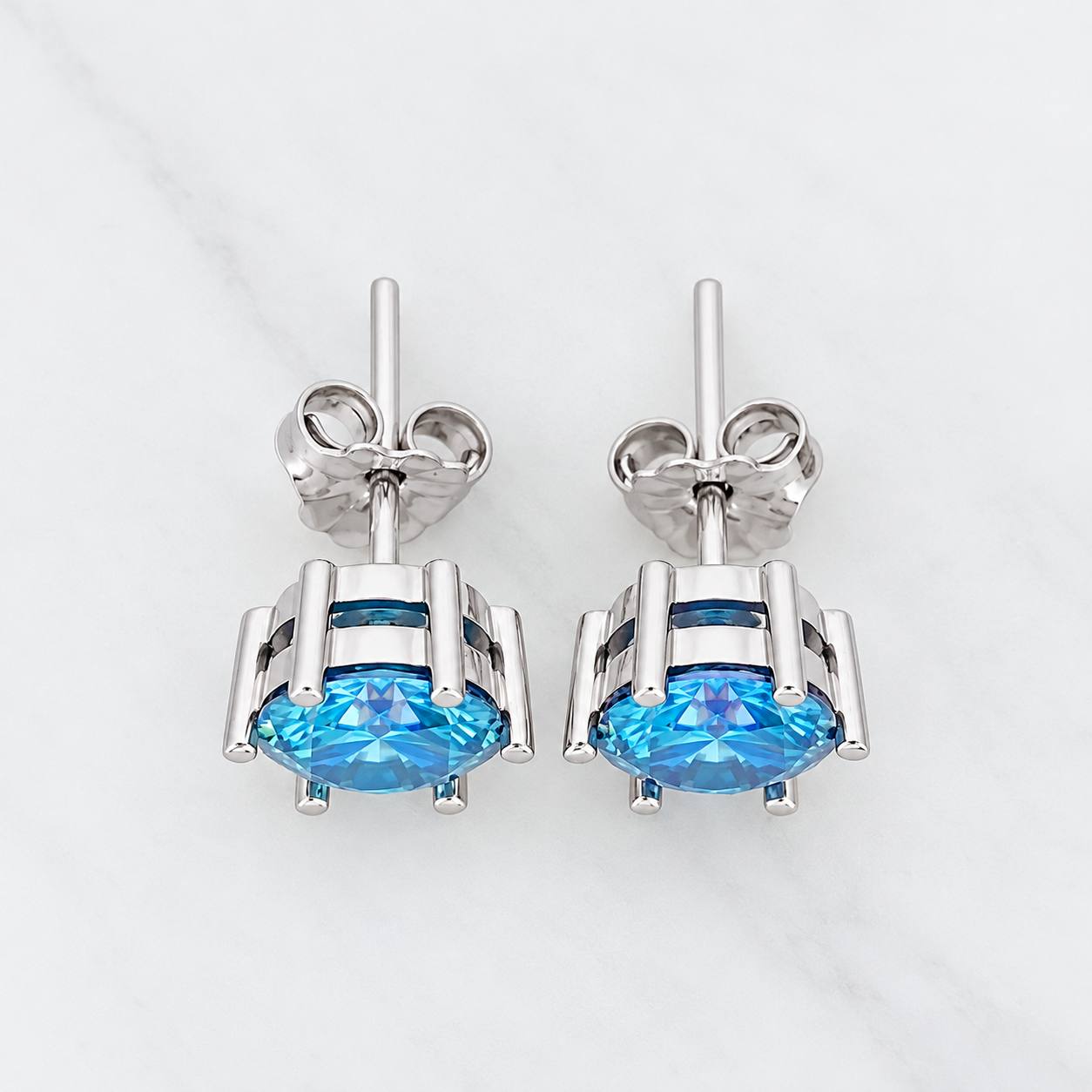 Topos Seis Garras Moisanita 1 Qts 2.15g / 7.16mm Oro Blanco 18K