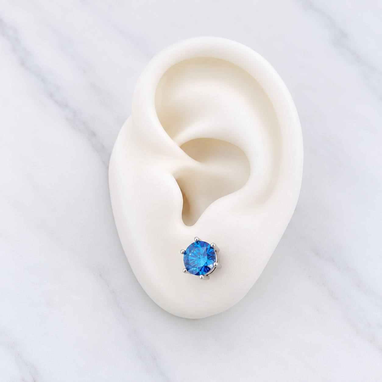Topos Seis Garras Moisanita 1 Qts 2.15g / 7.16mm Oro Blanco 18K