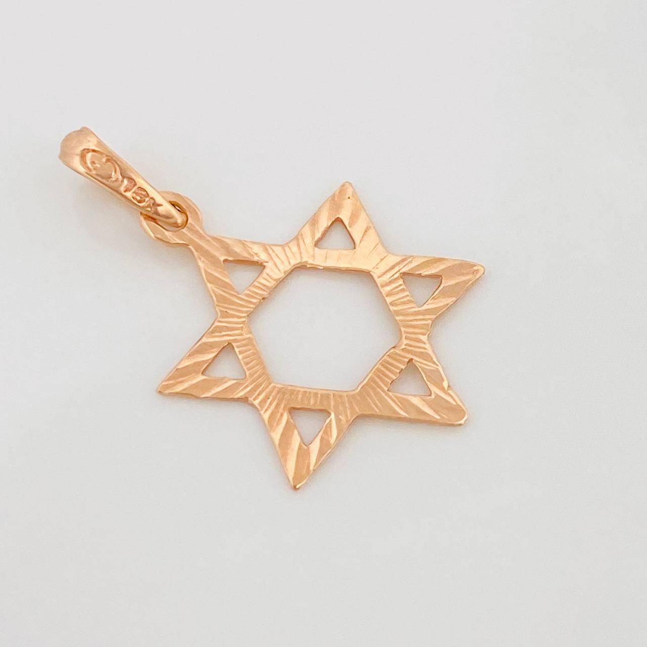 Dije Silueta Estrella 0.75g / 2.5cm Oro Rosa 18K