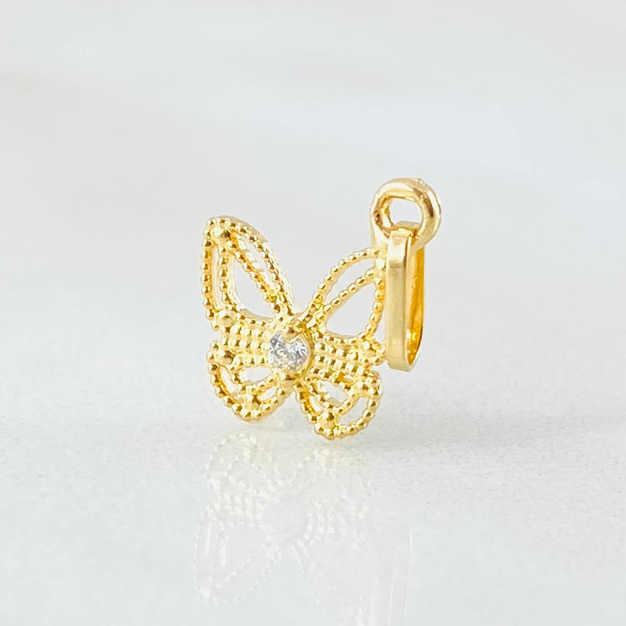 Dije Mariposa 0.4gr / 1.6cm / Oro Amarillo 18K *