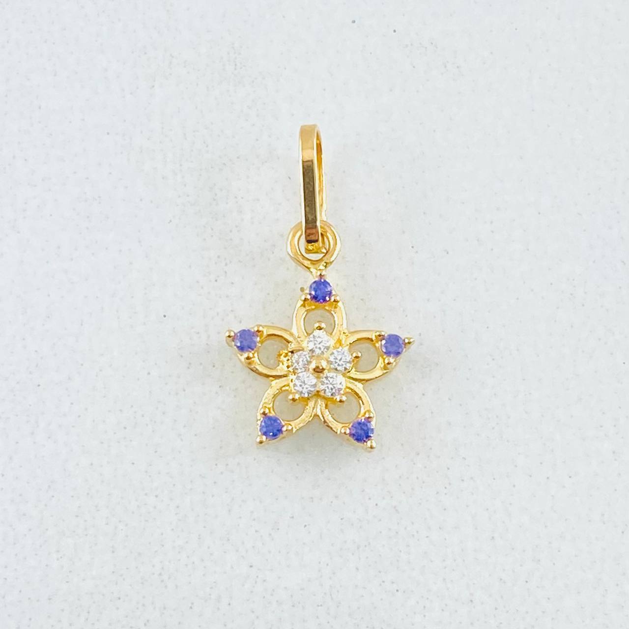 Dije Flor Cinco Petalos 0.5gr / 1.4cm / Oro Amarillo 18K *