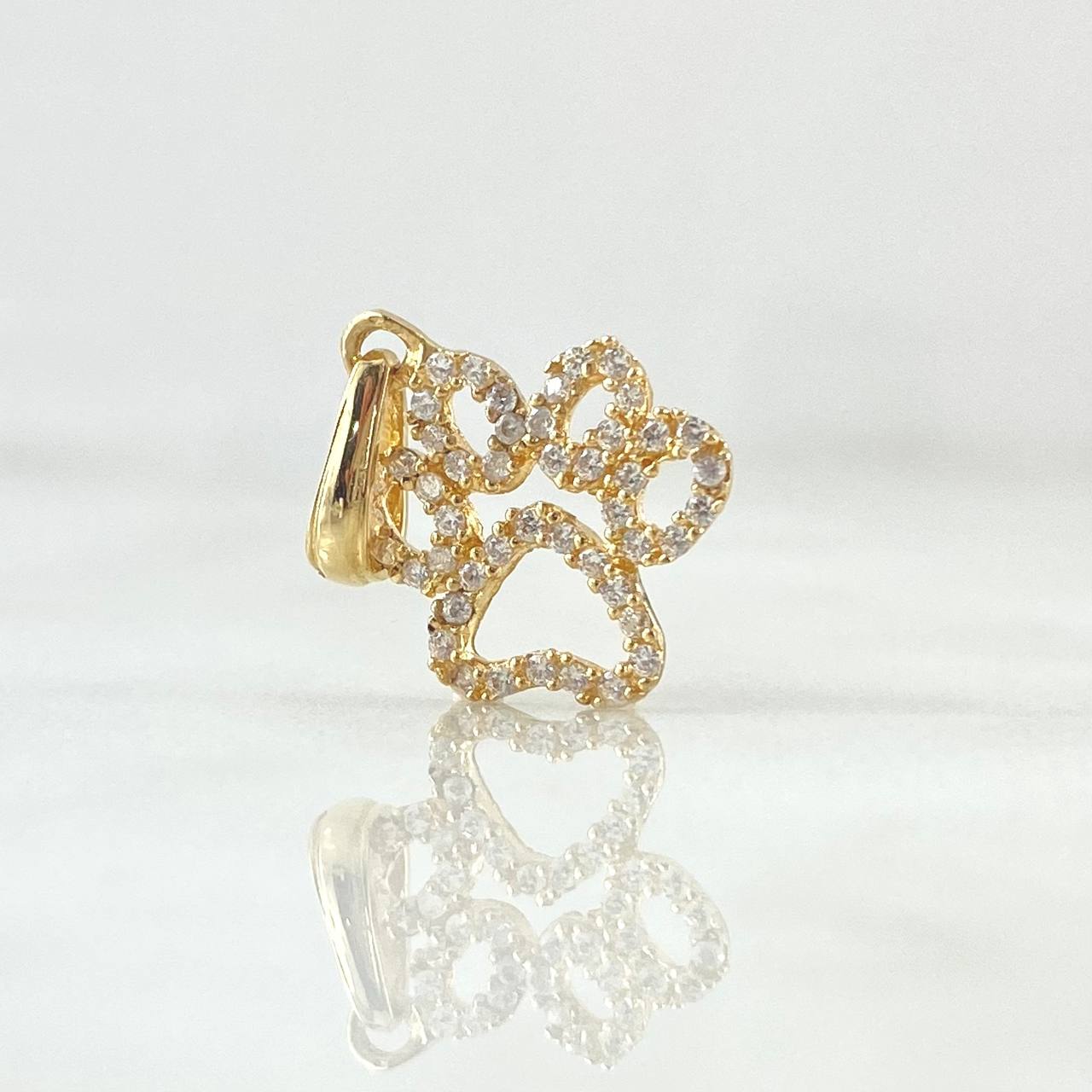 Dije Huella 0.95gr / 2cm / Circones Blancos Oro Amarillo 18K