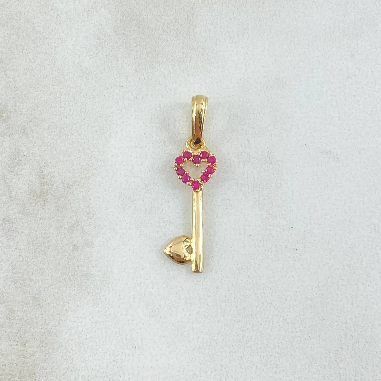 Dije Llave Corazón Hueco 0.75gr / 2.6cm / Circones Fucsias Oro Amarillo 18K