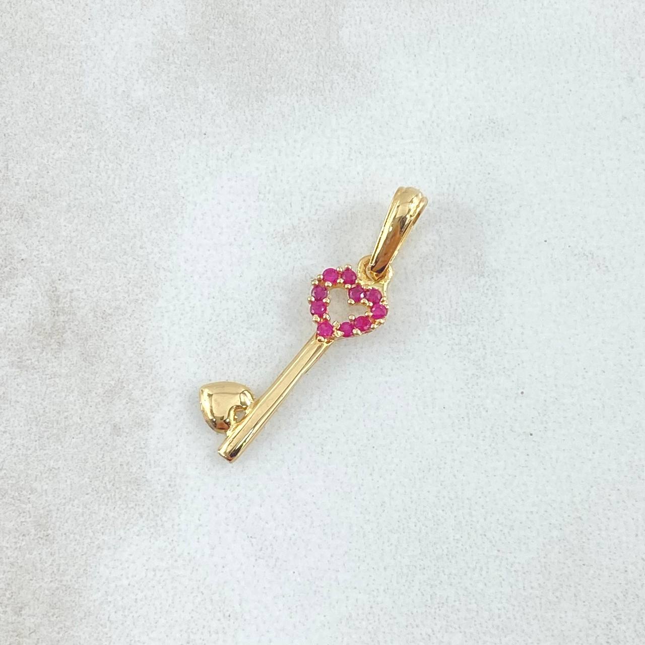 Dije Llave Corazón Hueco 0.75gr / 2.6cm / Circones Fucsias Oro Amarillo 18K