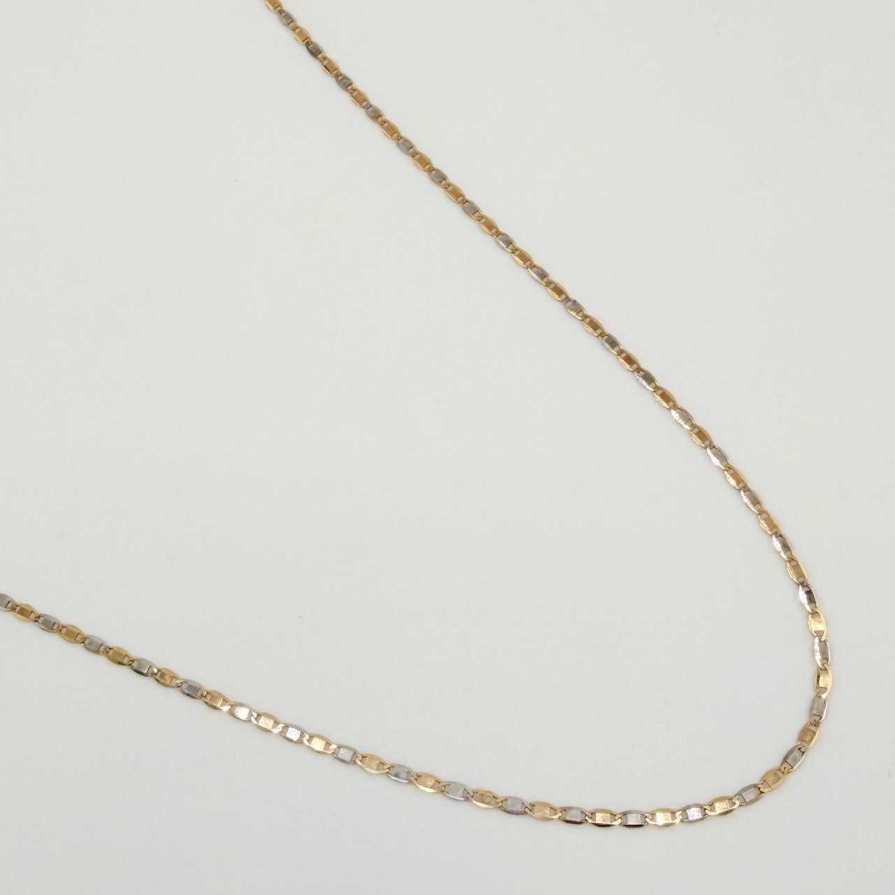 Cadena Escalera Plana 1.8gr / 45.5cm / 1.3mm Oro Amarillo +3 18K %