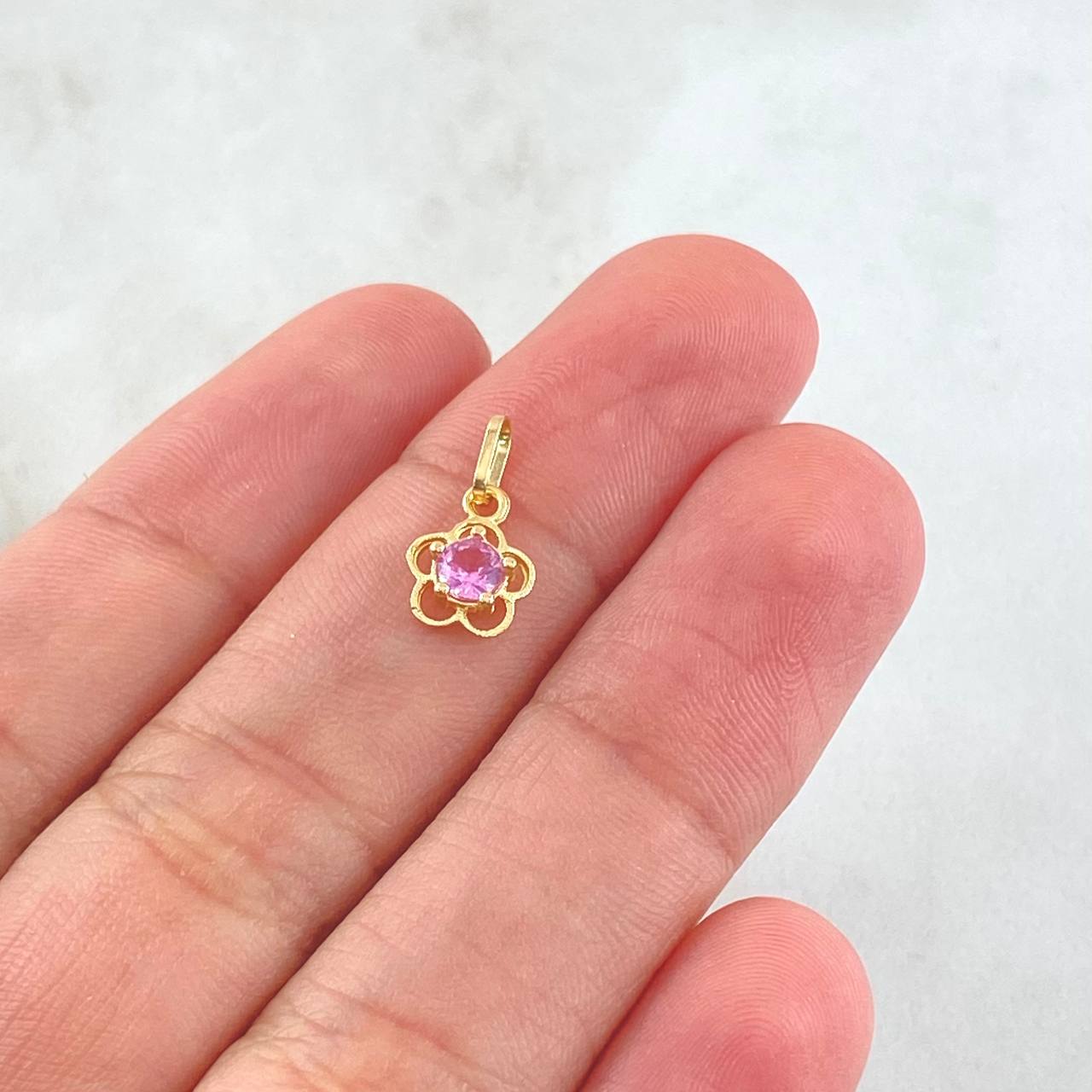 Dije Flor Silueta 0.4gr / 1.3cm / Oro Amarillo 18K ©