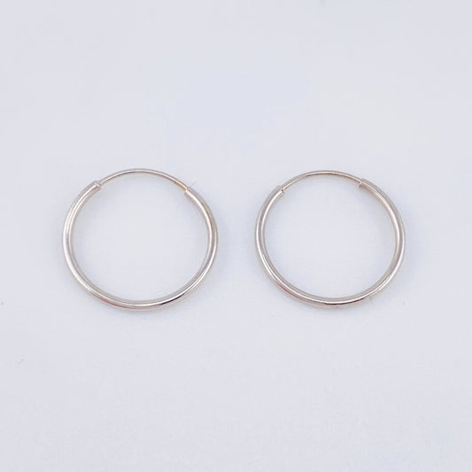 Candongas Aro Liso 0.6gr / 1.4cm / Oro Blanco 18K *