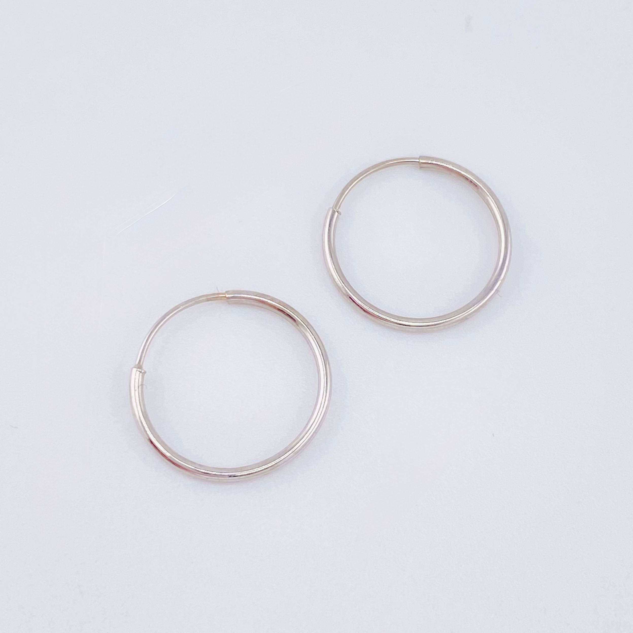 Candongas Aro Liso 0.6gr / 1.4cm / Oro Blanco 18K