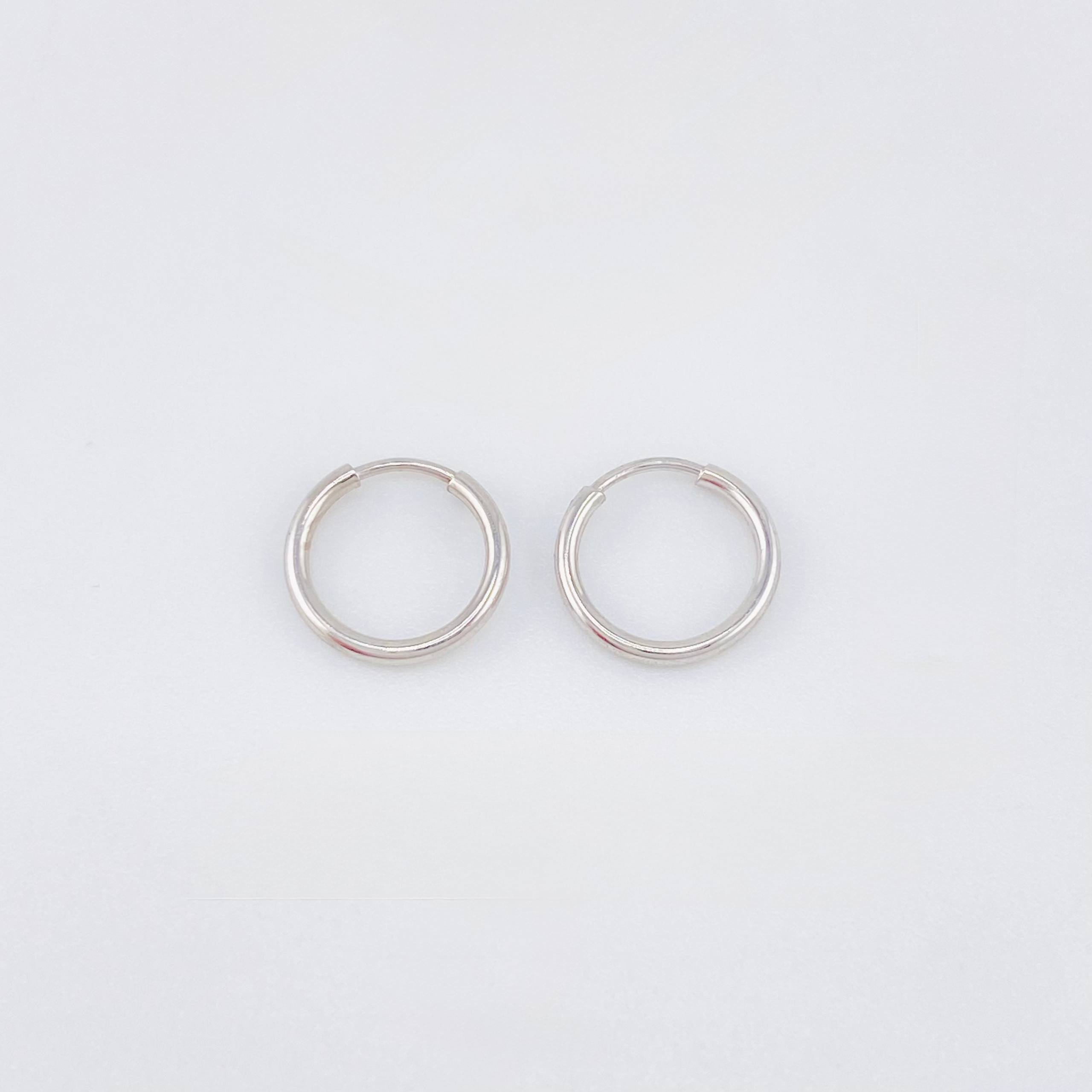 Candongas Aro Liso 0.35gr / 9mm Oro Blanco 18K *