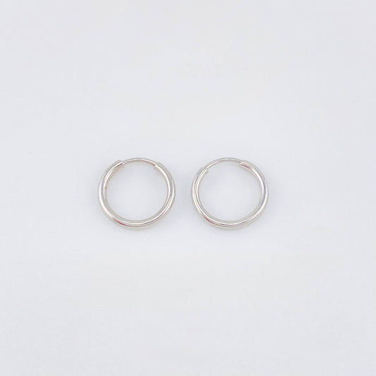 Candongas Mini Aro Liso 0.35gr / 9mm Oro Blanco 18K