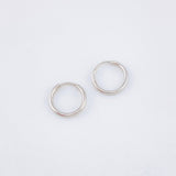 Candongas Mini Aro Liso 0.35gr / 9mm Oro Blanco 18K