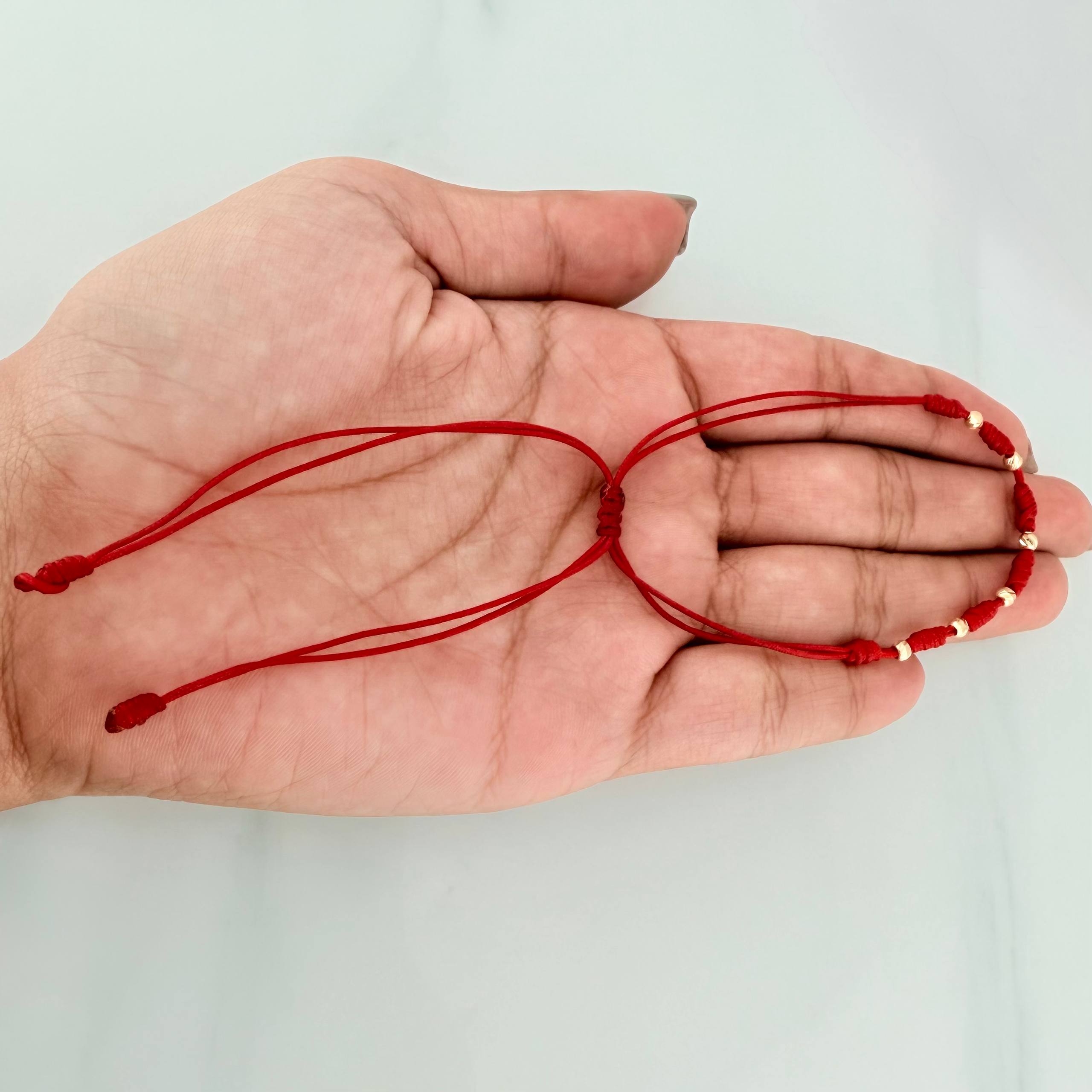 Pulsera Tejida Roja Bolas Diamantadas 3mm Oro Amarillo 18K