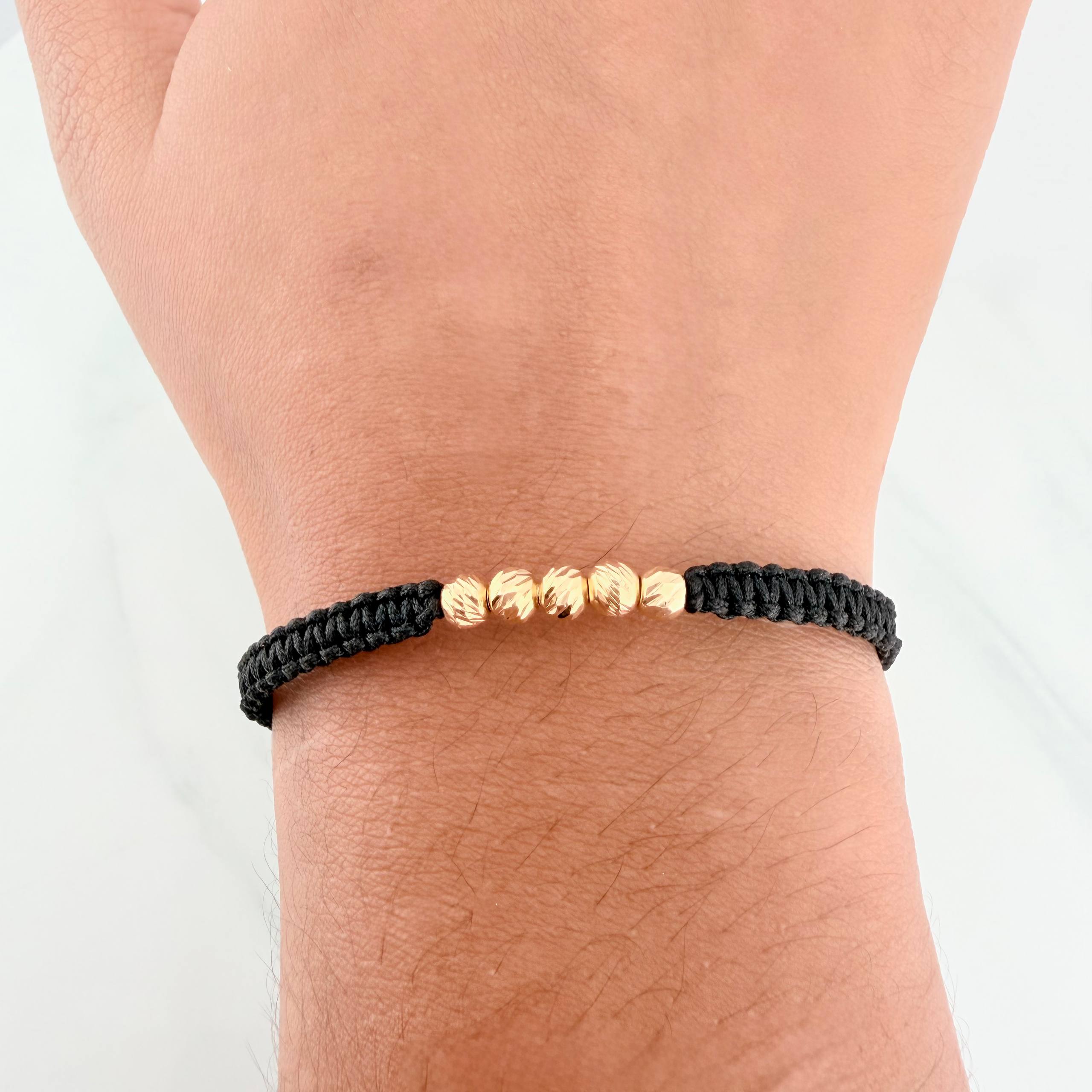 Pulsera Tejida Negra Bolas Diamantadas 4mm Oro Amarillo 18K