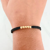 Pulsera Tejida Negra Bolas Diamantadas 4mm Oro Amarillo 18K