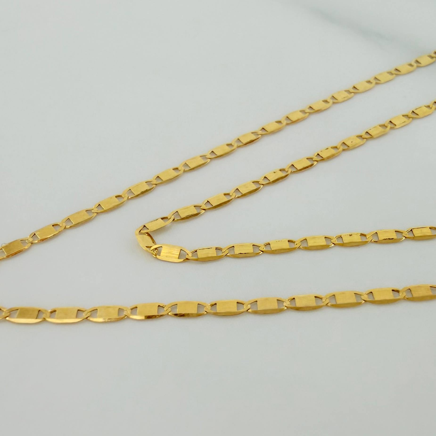 Cadena Escalera Plana 1.35 g / 50.3 cm / 1.41 mm Oro Amarillo 18K