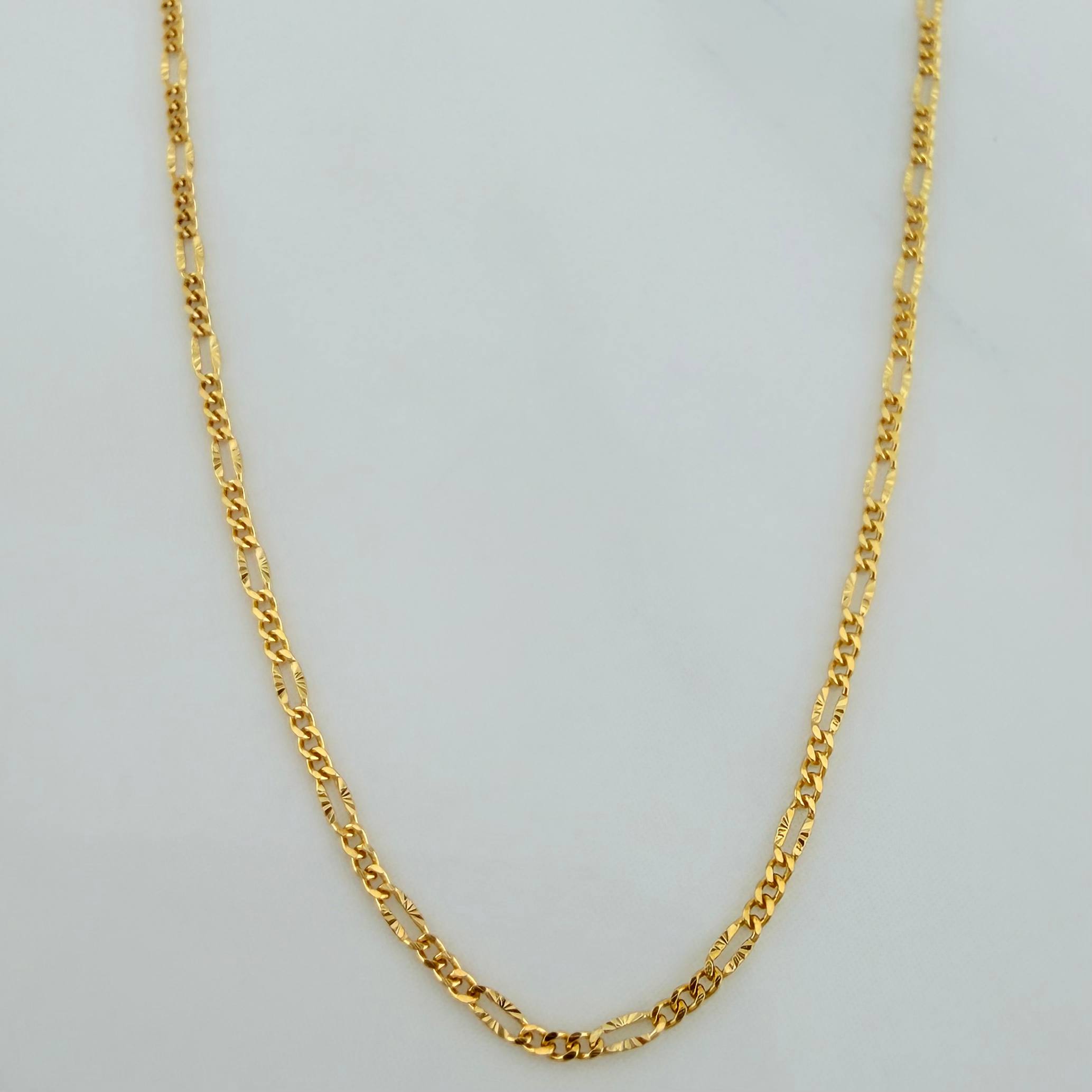 Cadena Figaro Diamantada 1.15 g / 45.4 cm / 0.87 mm Oro Amarillo 18K