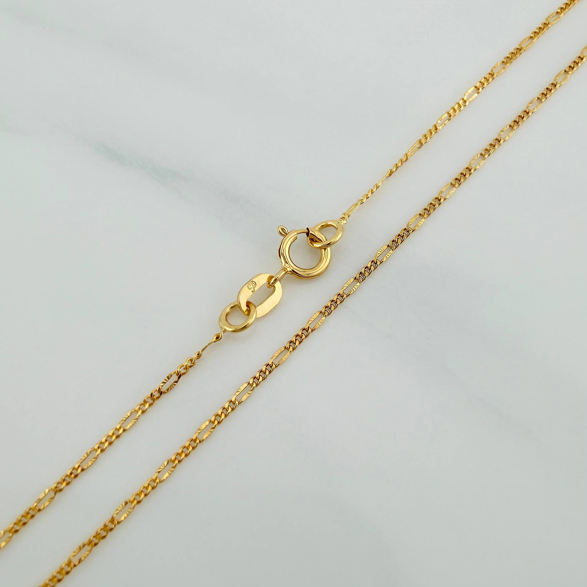 Cadena Figaro Diamantada 1.15 g / 45.4 cm / 0.87 mm Oro Amarillo 18K