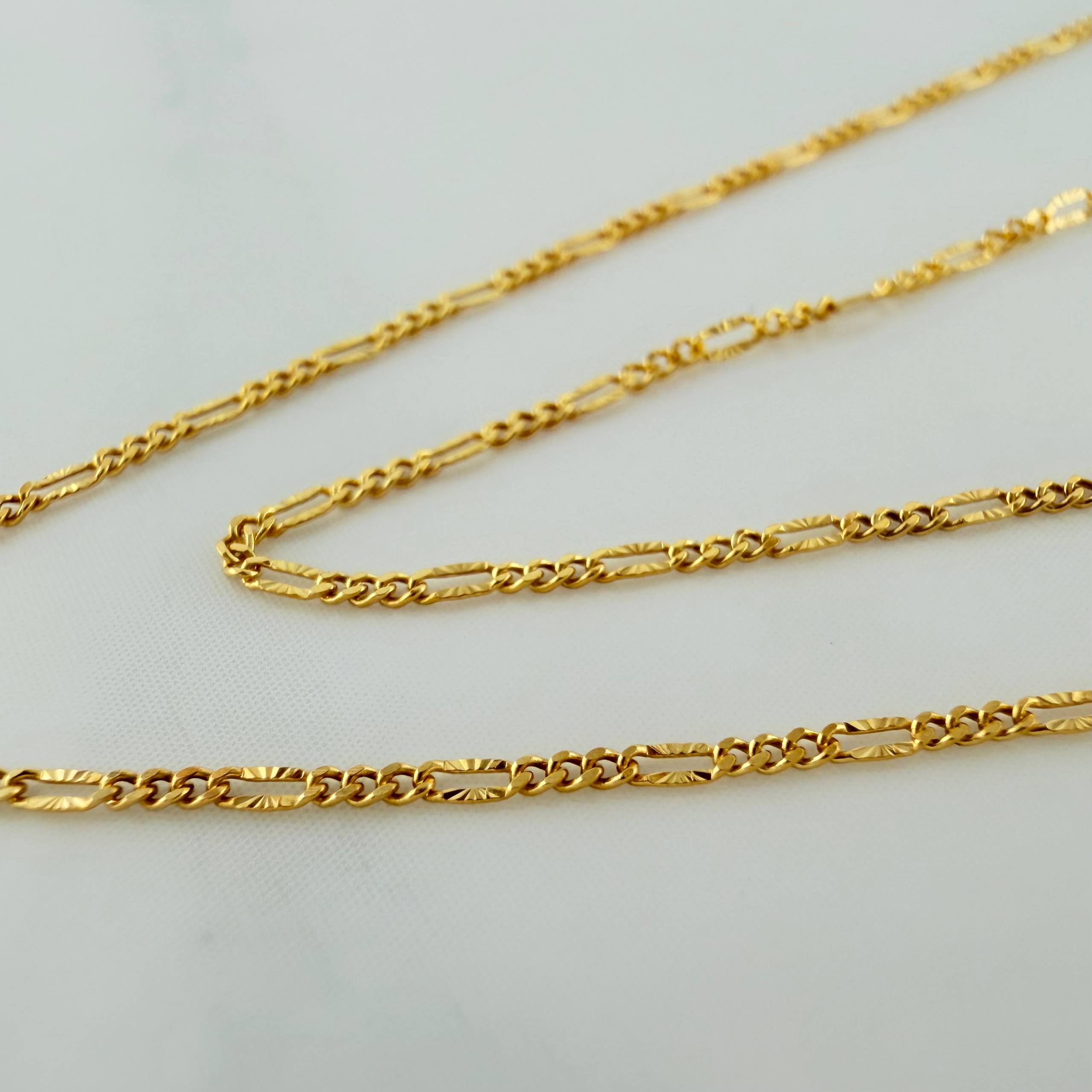 Cadena Figaro Diamantada 1.15 g / 45.4 cm / 0.87 mm Oro Amarillo 18K