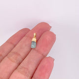 Dije Morralla Esmeralda 0.6g / 1.6cm Oro Amarillo 18K