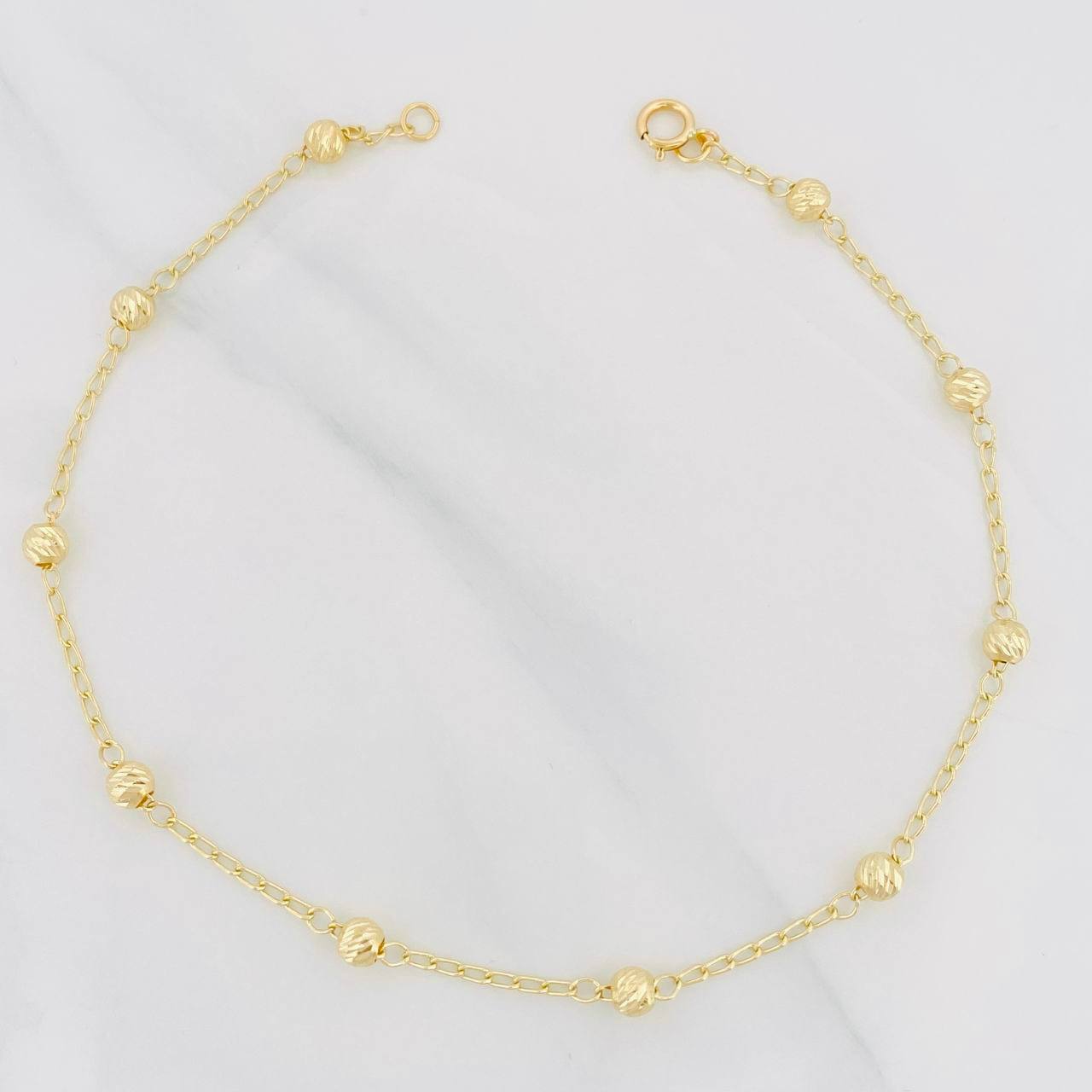 Tobillera Espiga Bolas Diamantados 2.2g / 24.05cm / 1.28mm Oro Amarillo 18K