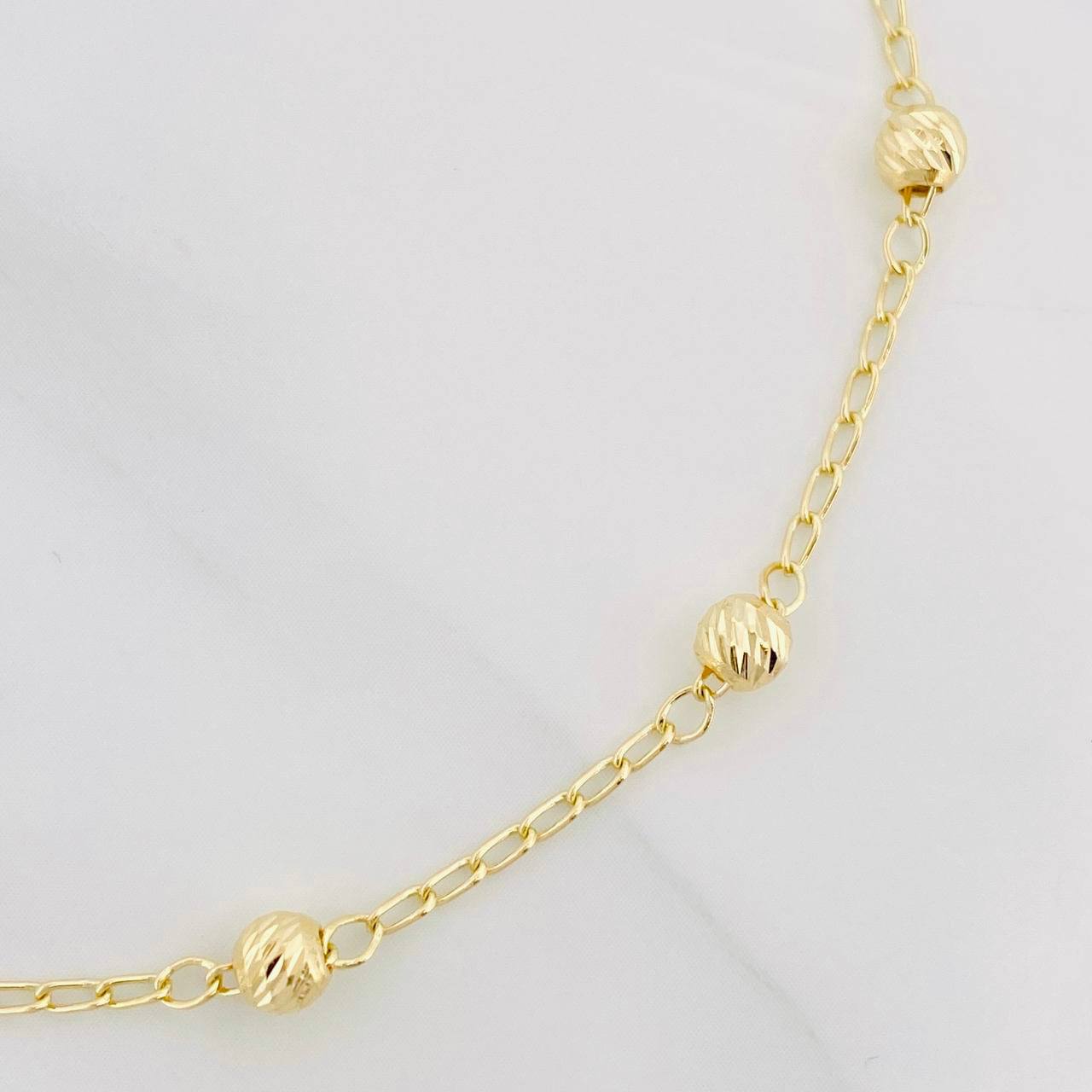 Tobillera Espiga Bolas Diamantados 2.2g / 24.05cm / 1.28mm Oro Amarillo 18K