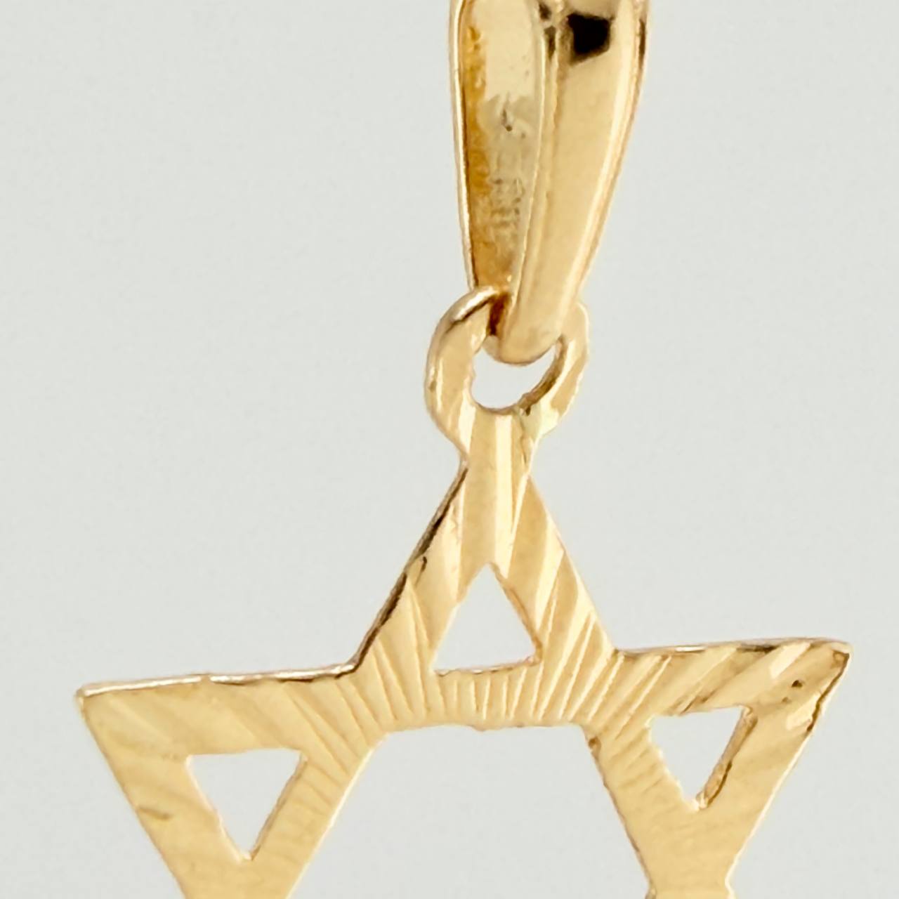 Dije Estrella De David 0.9gr / 2.5cm / Oro Amarillo 18K %