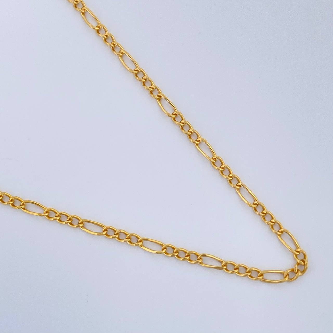 Cadena Figaro 1.05gr / 45cm / 1.35mm Oro Amarillo +1 18K $