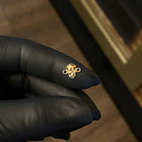 Herraje Calavera 0.45gr / 1cm Oro Amarillo