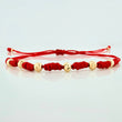 Pulsera Tejida Roja Bolas Diamantadas Oro Amarillo 18K