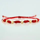 Pulsera Tejida Roja Bolas Diamantadas Oro Amarillo 18K