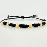 Pulsera Tejida Negra Bolas Diamantadas Oro Amarillo 18K
