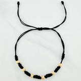 Pulsera Tejida Negra Bolas Diamantadas Oro Amarillo 18K