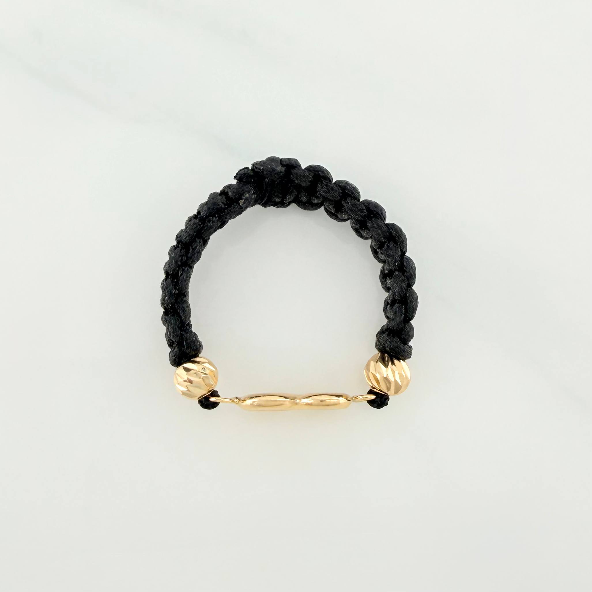 Anillo Tejido Negro Herraje Infinito 0.4 g / T7 Oro Amarillo 18K